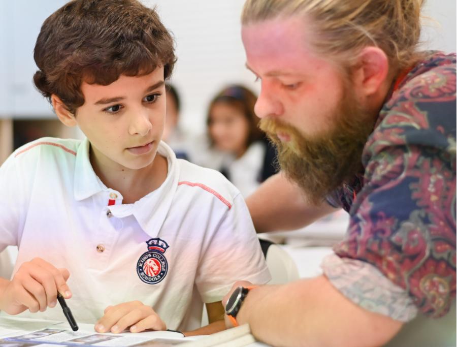 KC Cascais Student receiving guidance