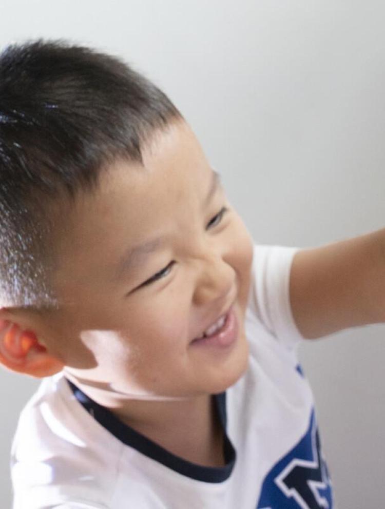 kindergarten student enjoying creative play