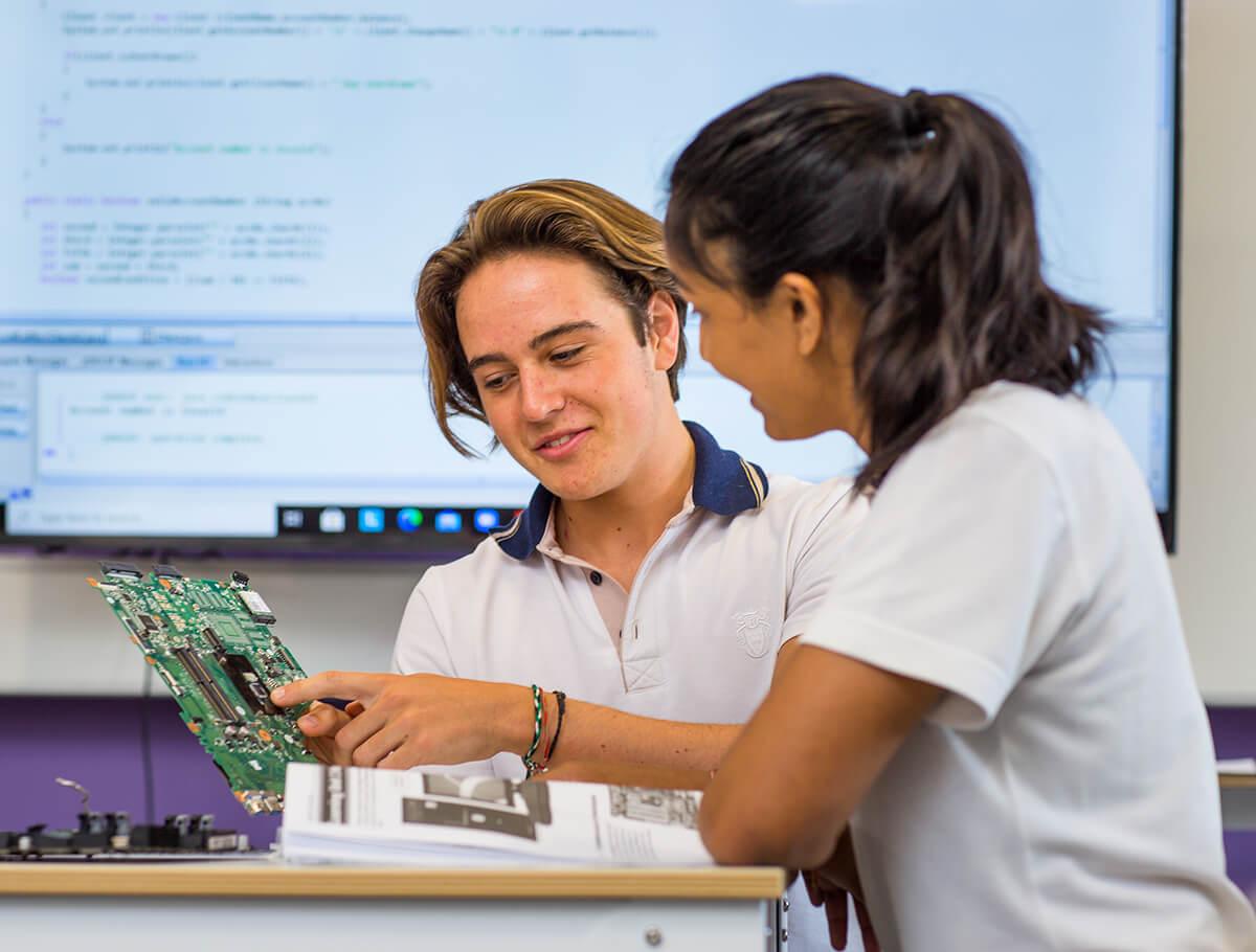 Students working with a circuit board