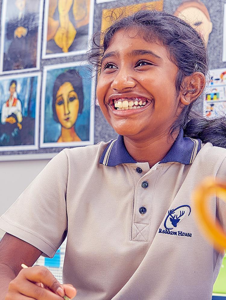 Book-a-visit-Preparatory-Girl-In-Class