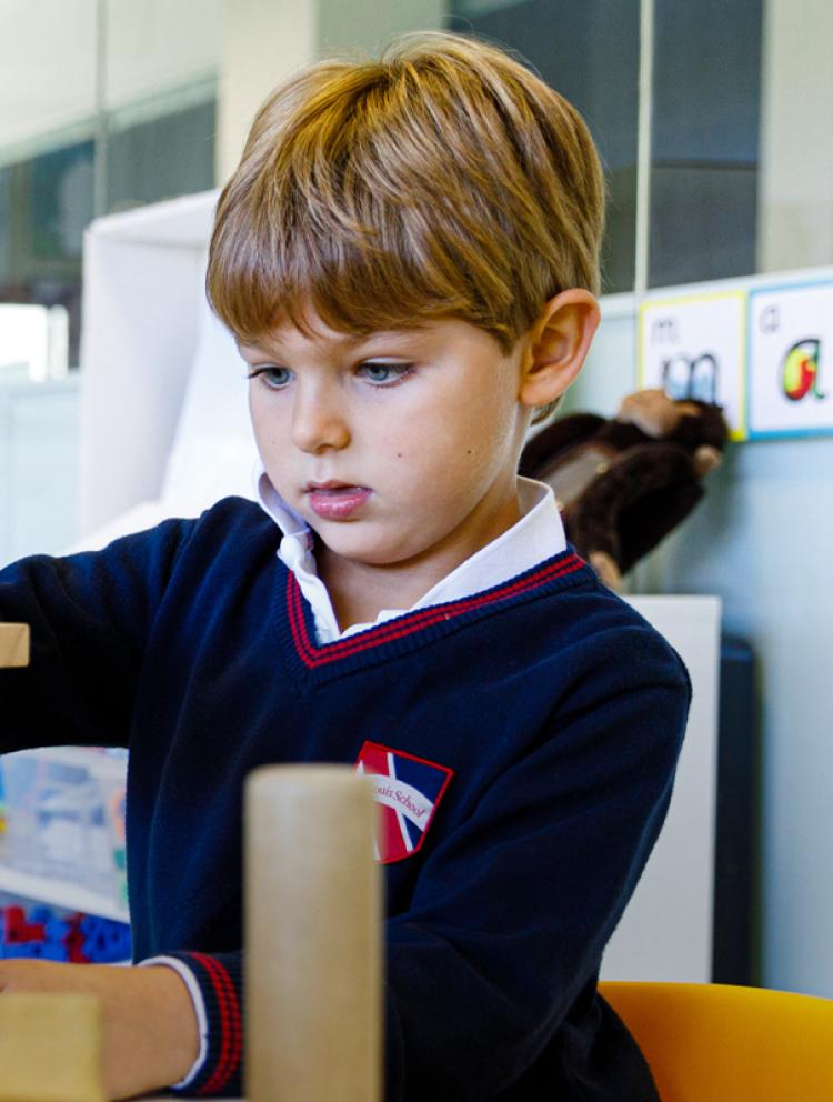personalised-tours-boy-playing-with-blocks