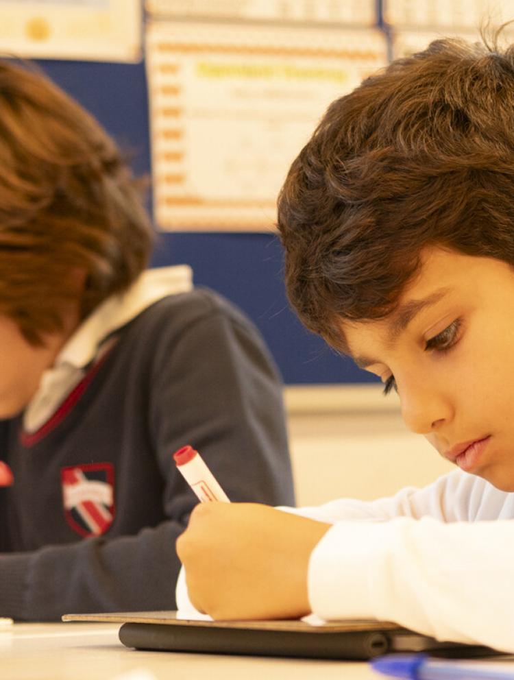 admissions-process-student-writing