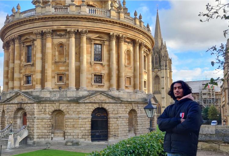 ACG Parnell College alumnus Sidhaarth Kumar beside the Radcliffe Camera in Oxford