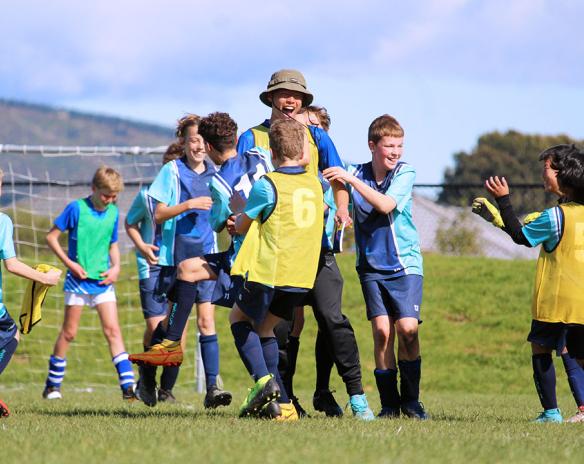 Ethan Foo with his AIMS Games team