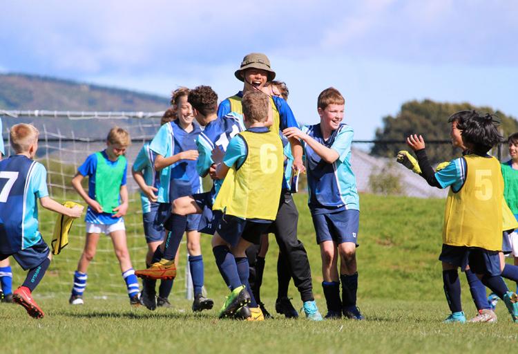 Ethan Foo with his AIMS Games team