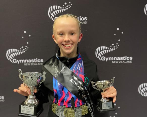 Gymnast with Trophies