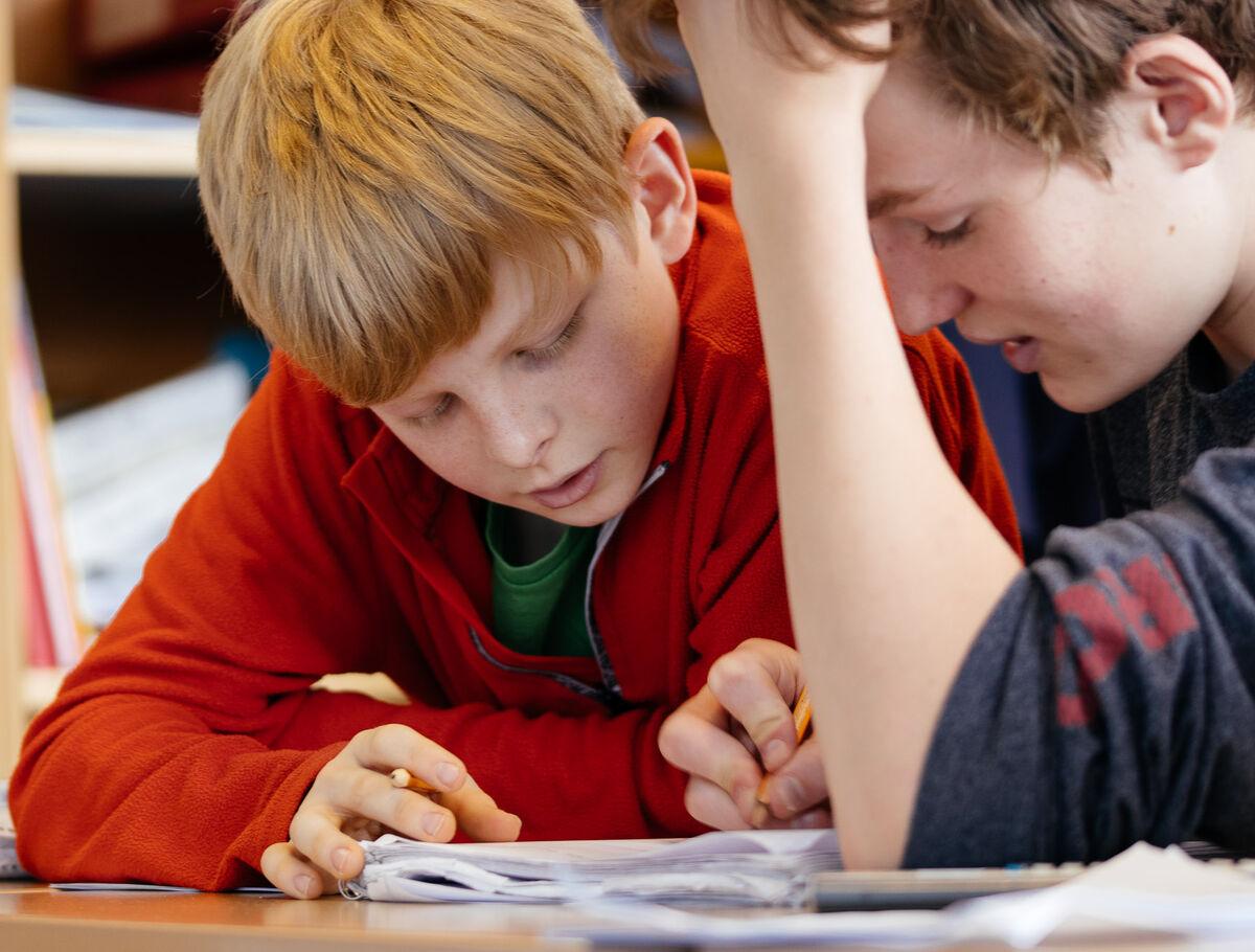 middle_school_students_writing