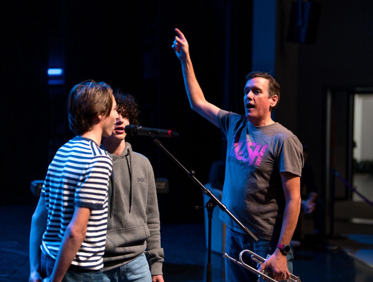students_and_teacher_at_the_music_theater