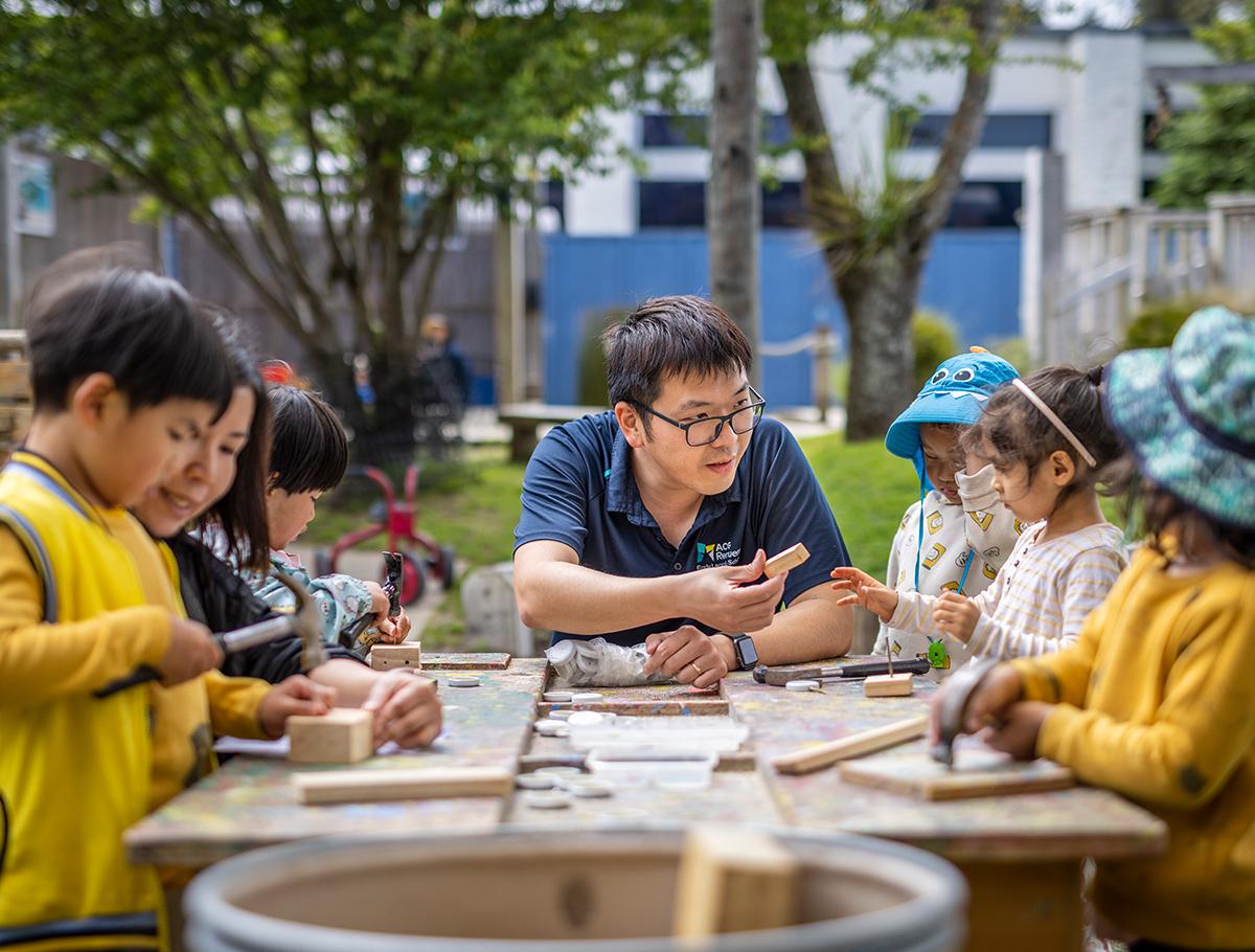 ACG-Remuera-Senior-Preschool-teacher-outdoors