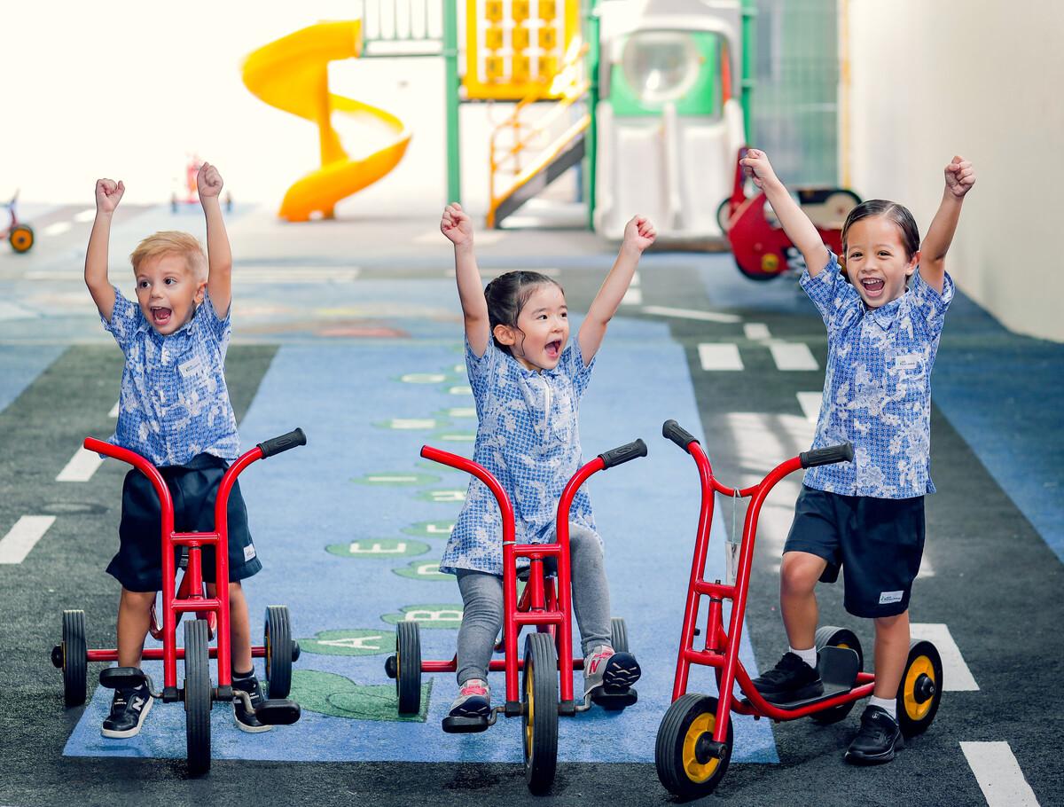 happy-children-playground-bikes