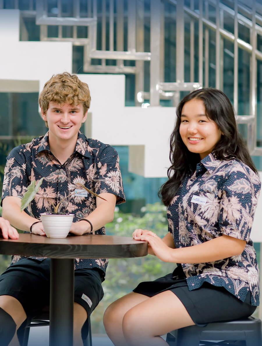 Students sitting on bench