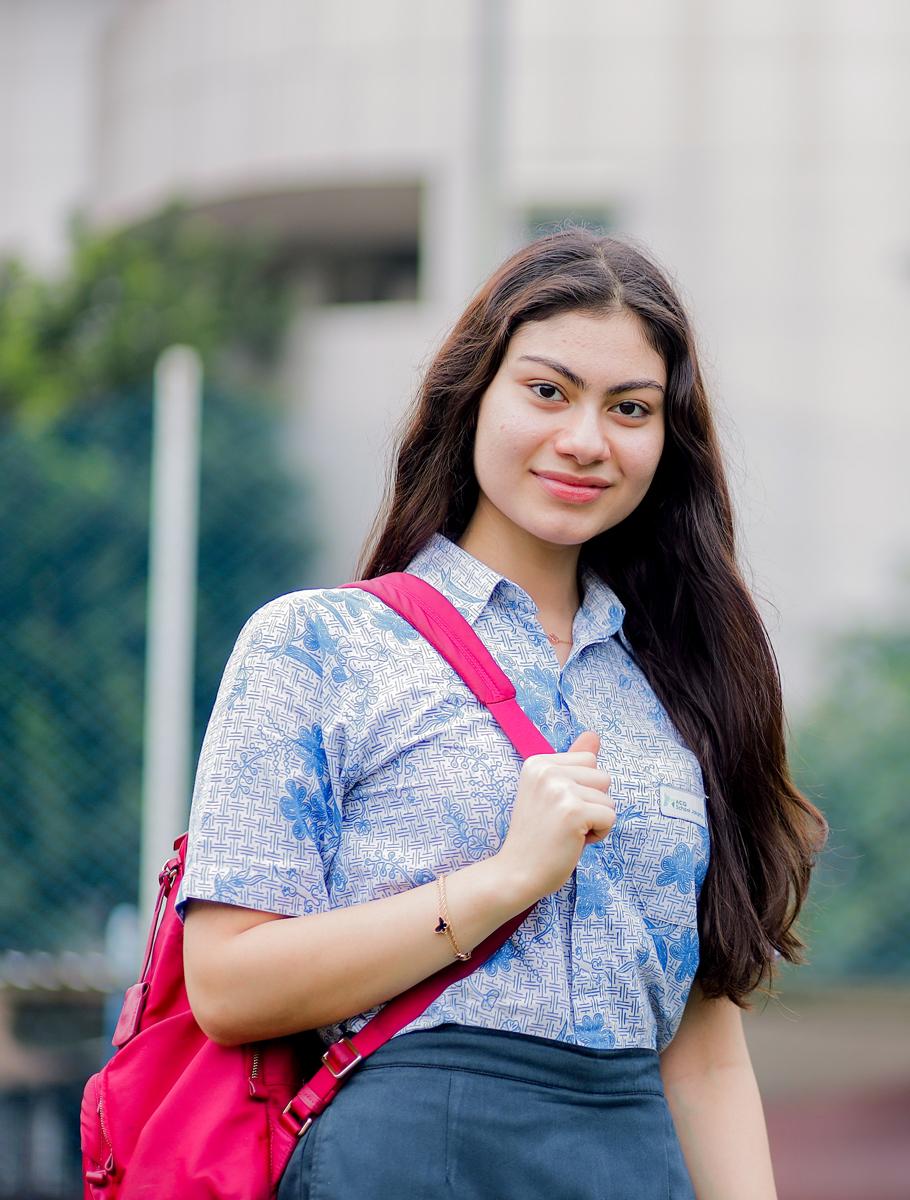 Student holding bag
