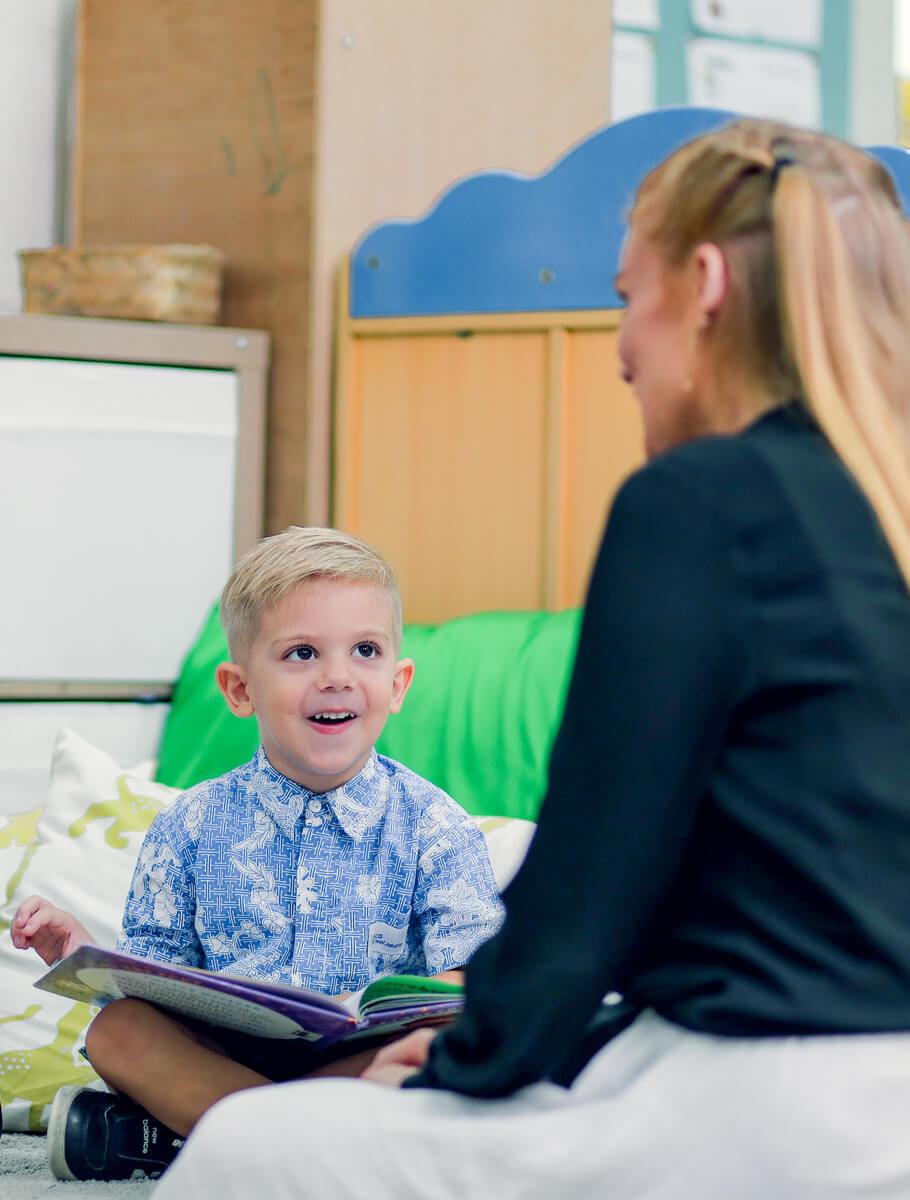 Student smiling at teacher