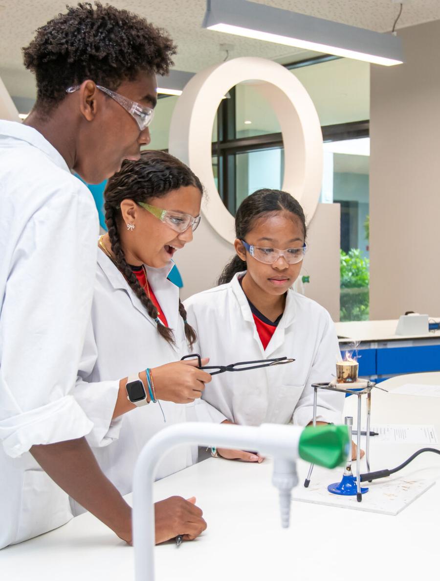 Students actively engaged with a science experiment