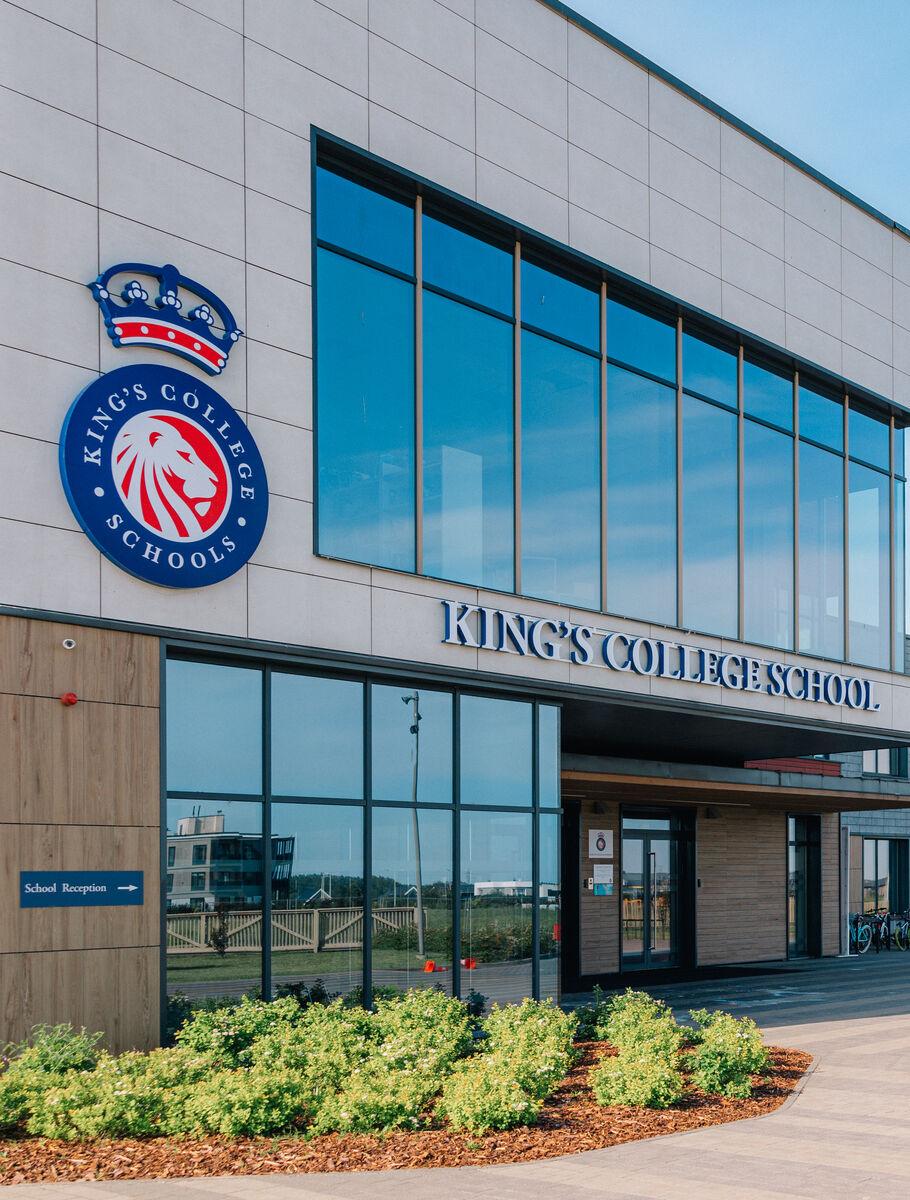 kc_latvia_-_front_of_school