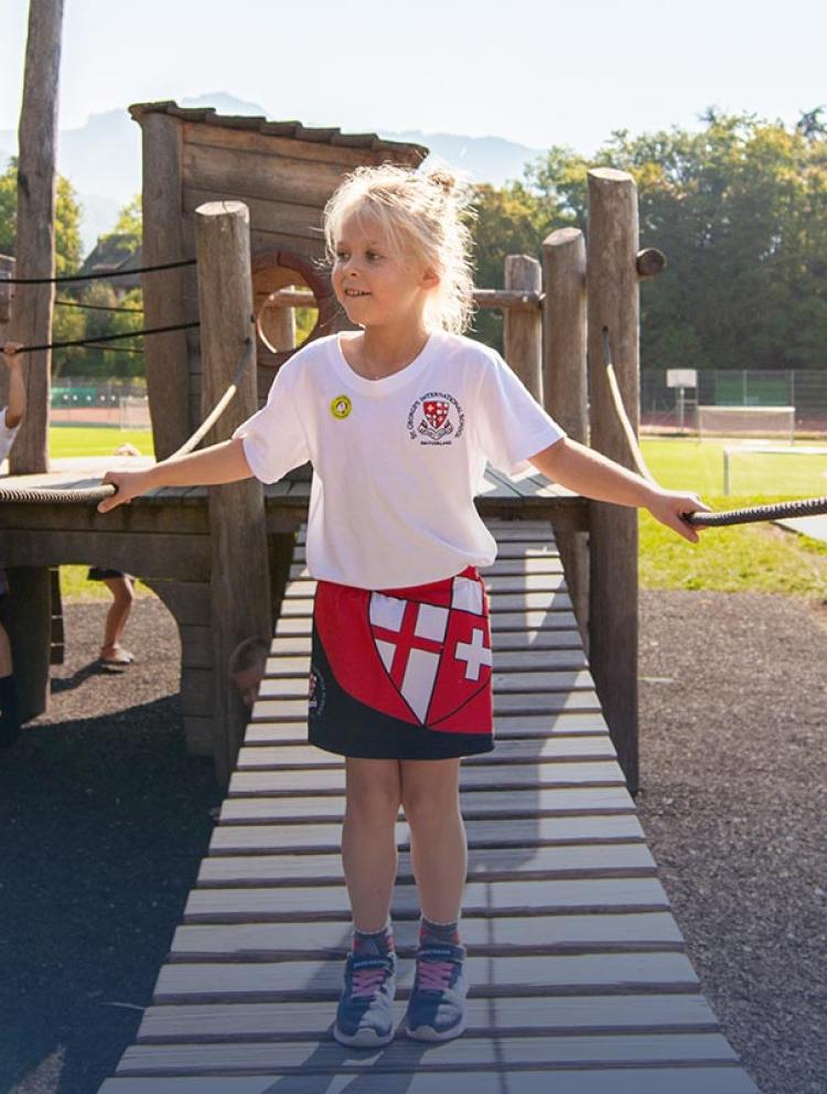 STGIS-About-Us-young-girl-playing-outside
