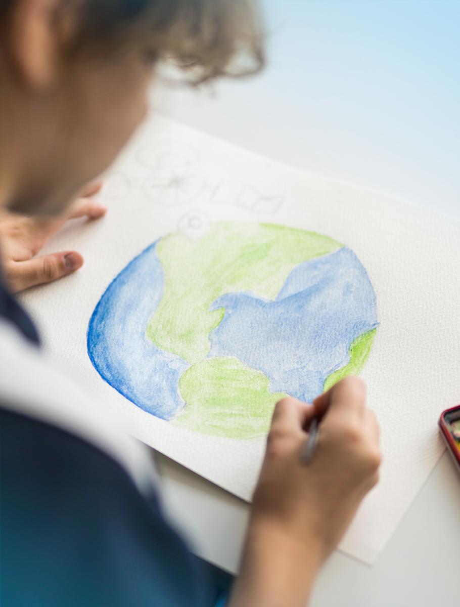 Student drawing world