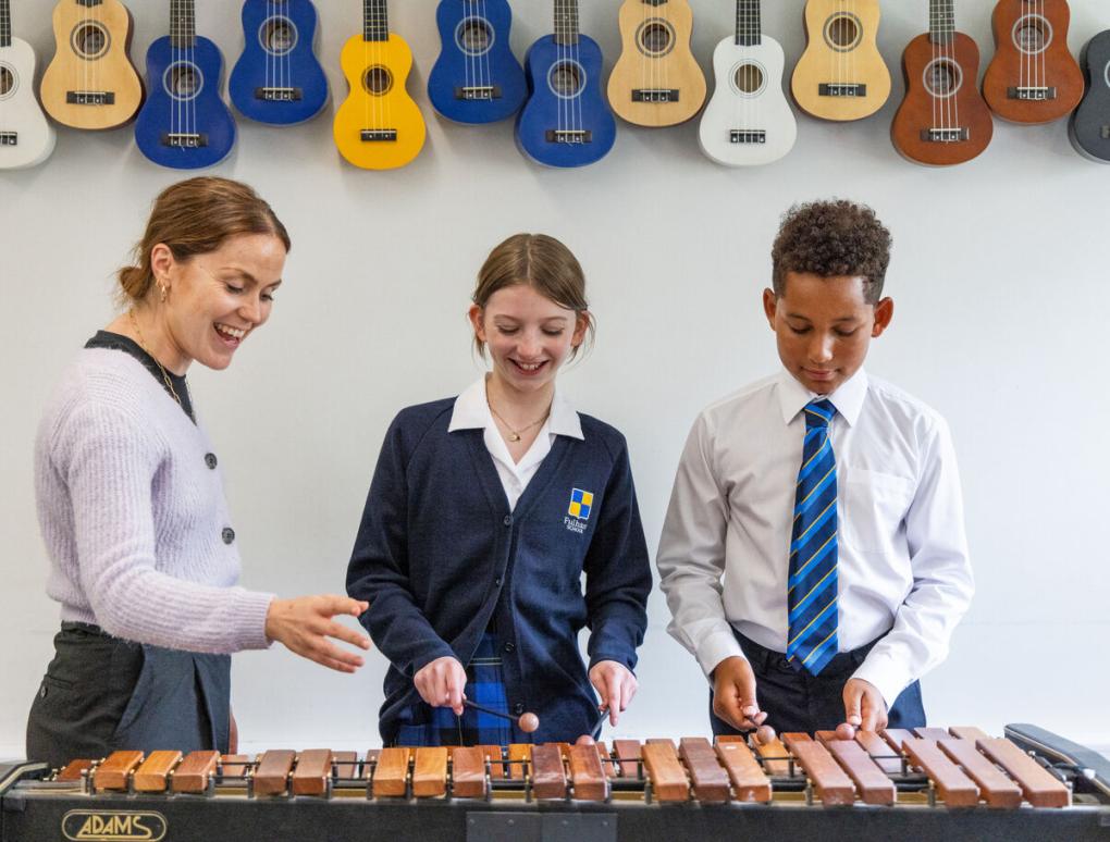 Music Teacher With Prep Students At Fulham School