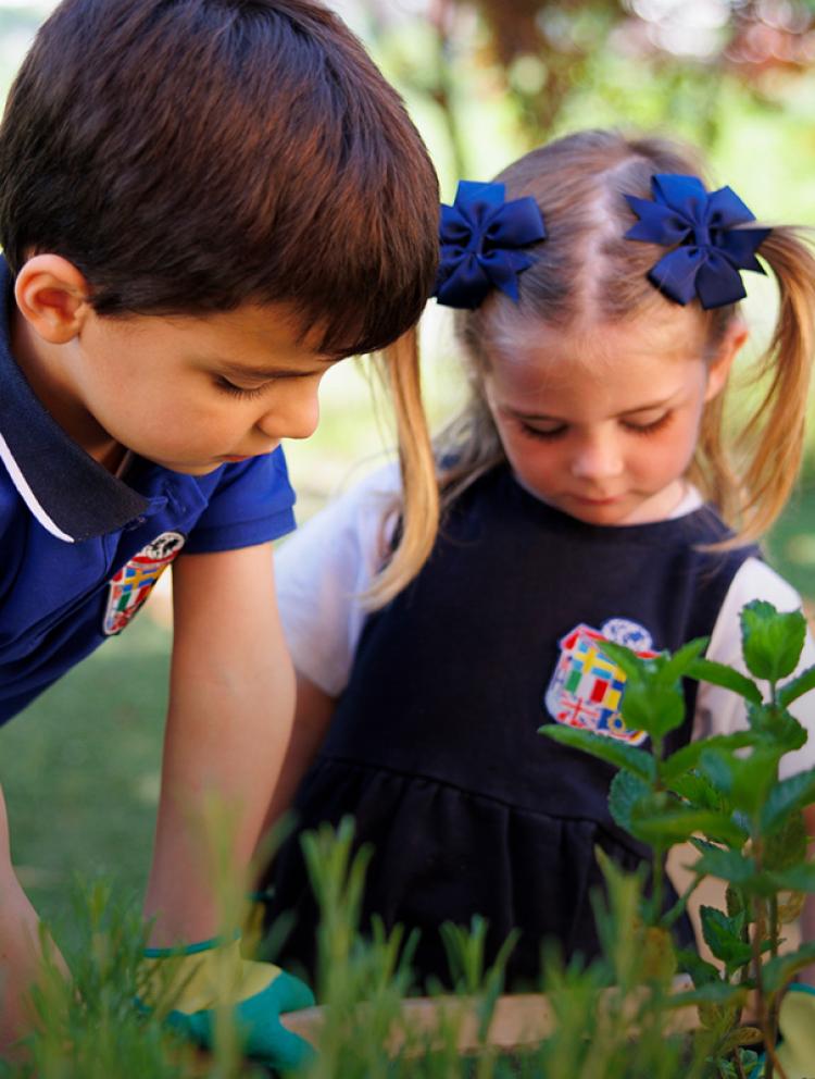 admissions-process-boy-girl-garden-plants