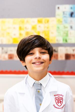 Boy doing science