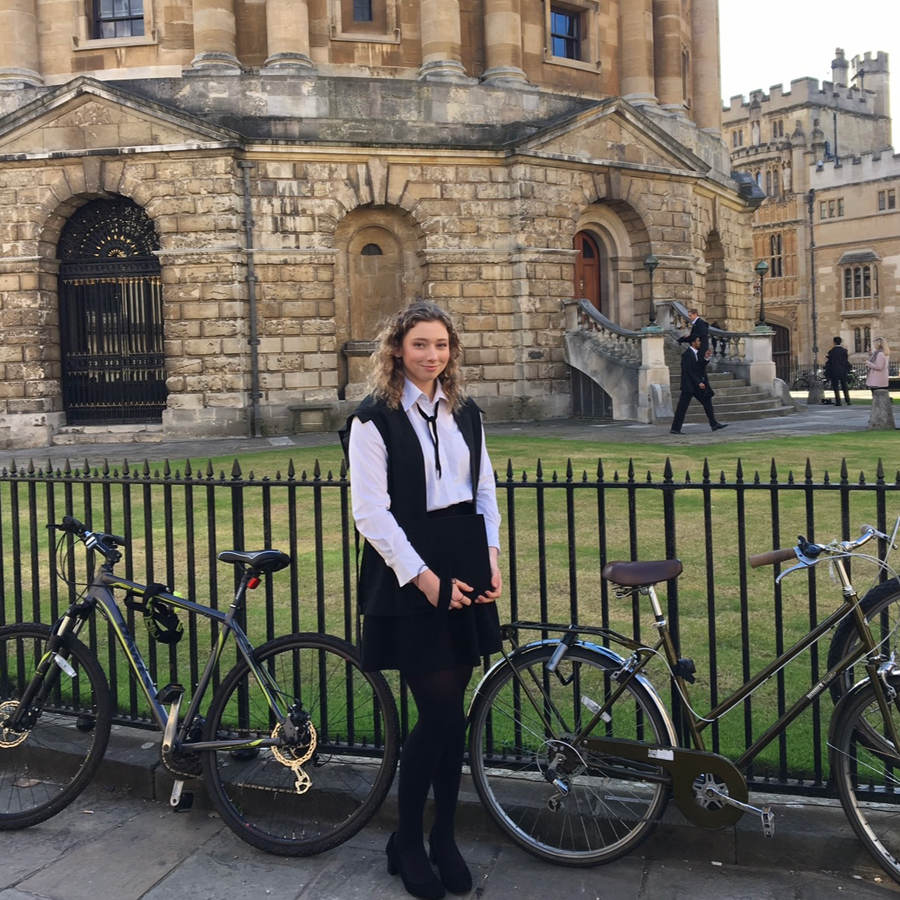 Caitlin next to bicycle