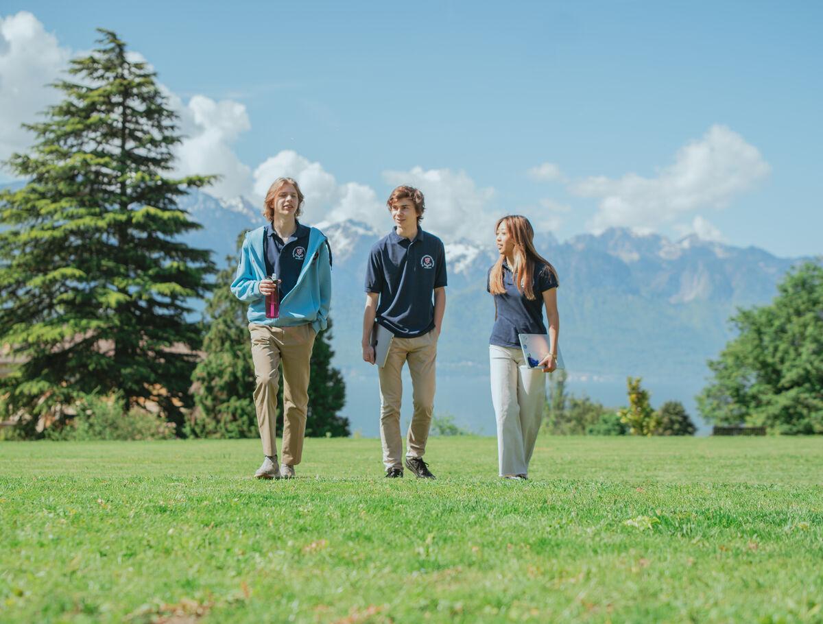 students walking across campus