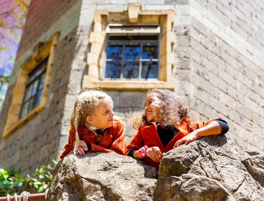Infant-students-conversing-outdoors