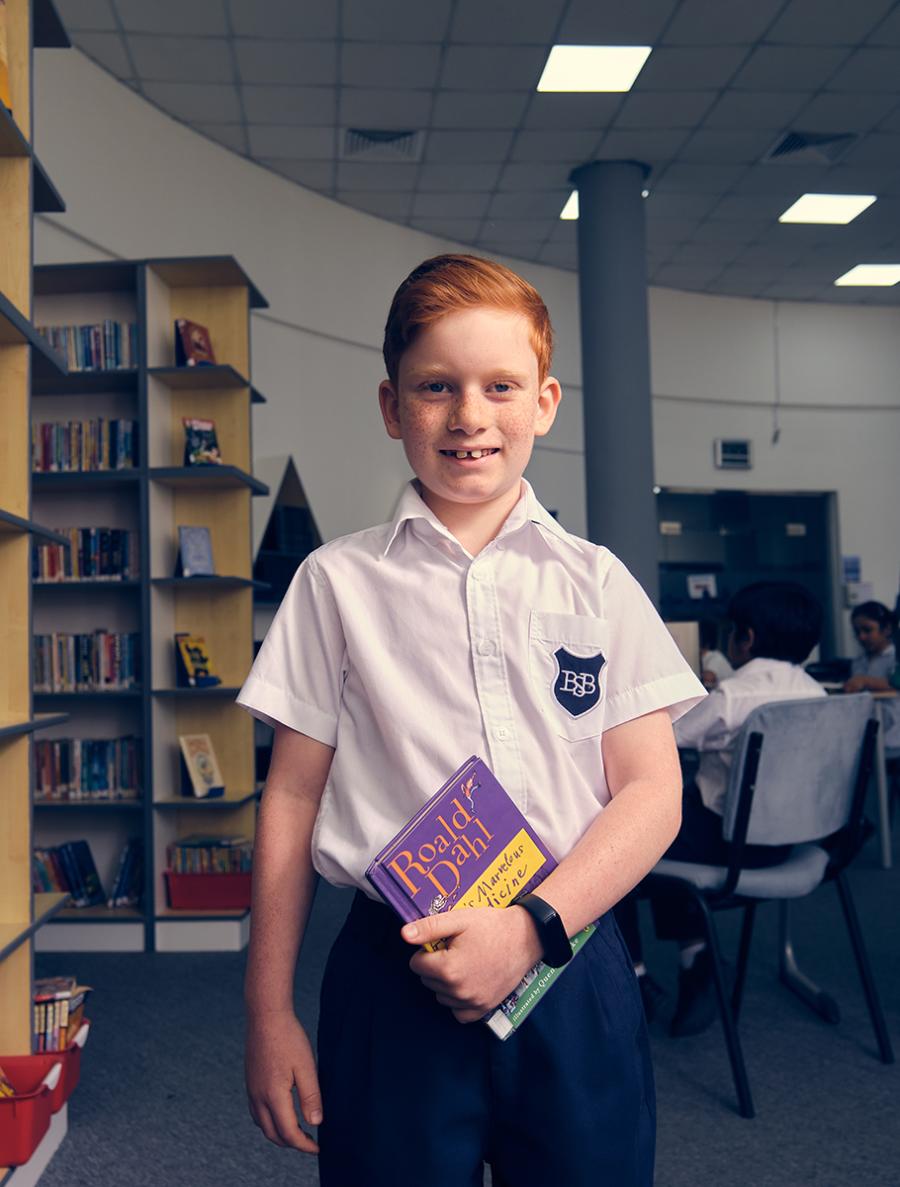 boy-in-a-book-in-the-library boy-in-a-book-in-the-library