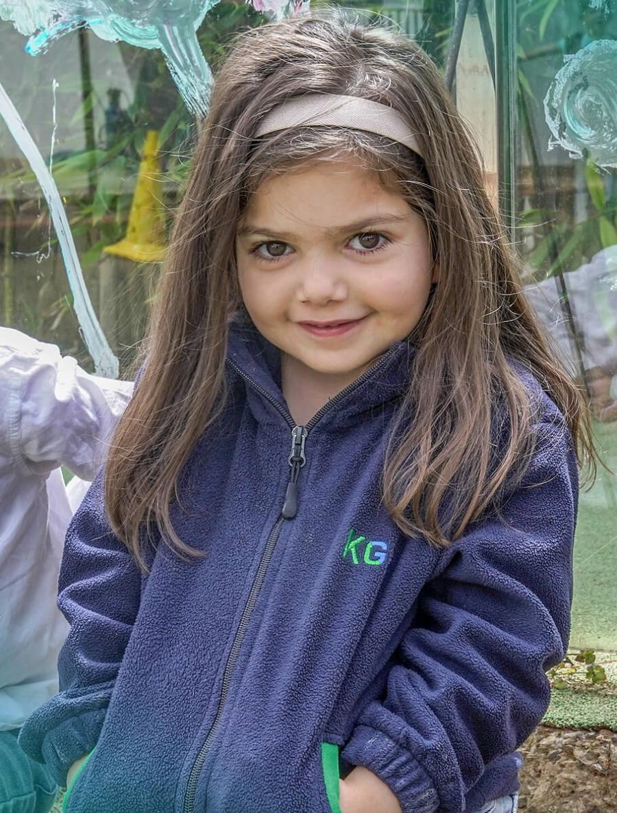 Kindergarten student smiling